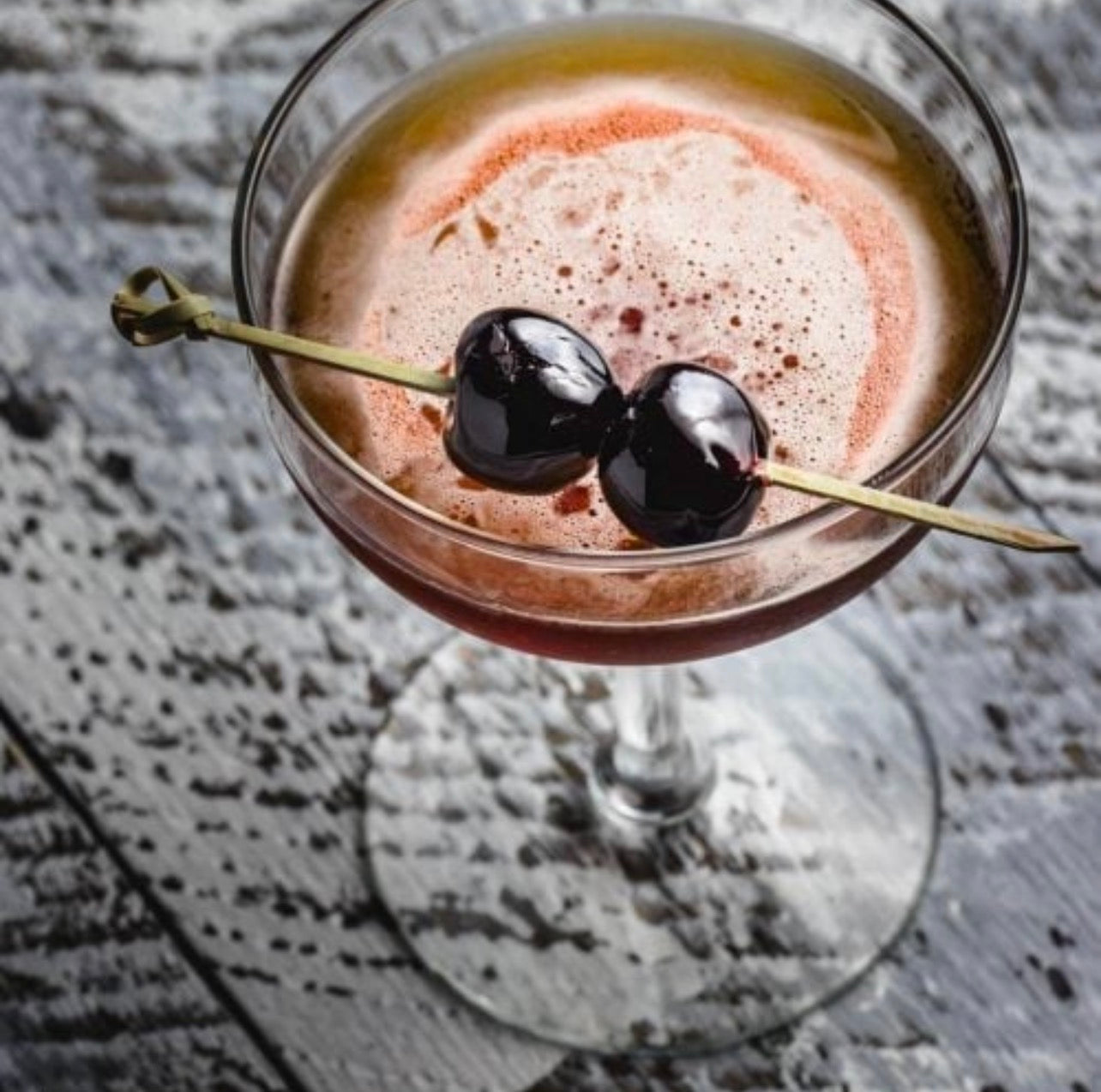 Manhattan cocktail garnished with Amarena cherries