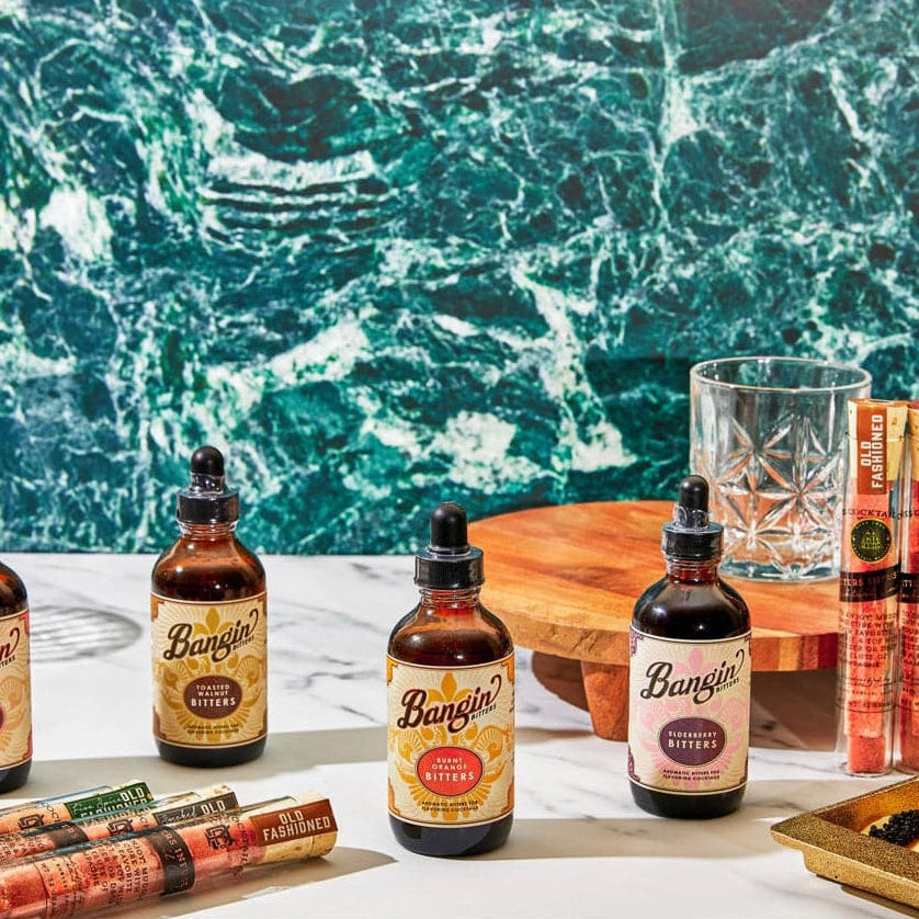 Bangin’ Bitters: Aromatic Cocktail Bitters Displayed with other flavors of bitters