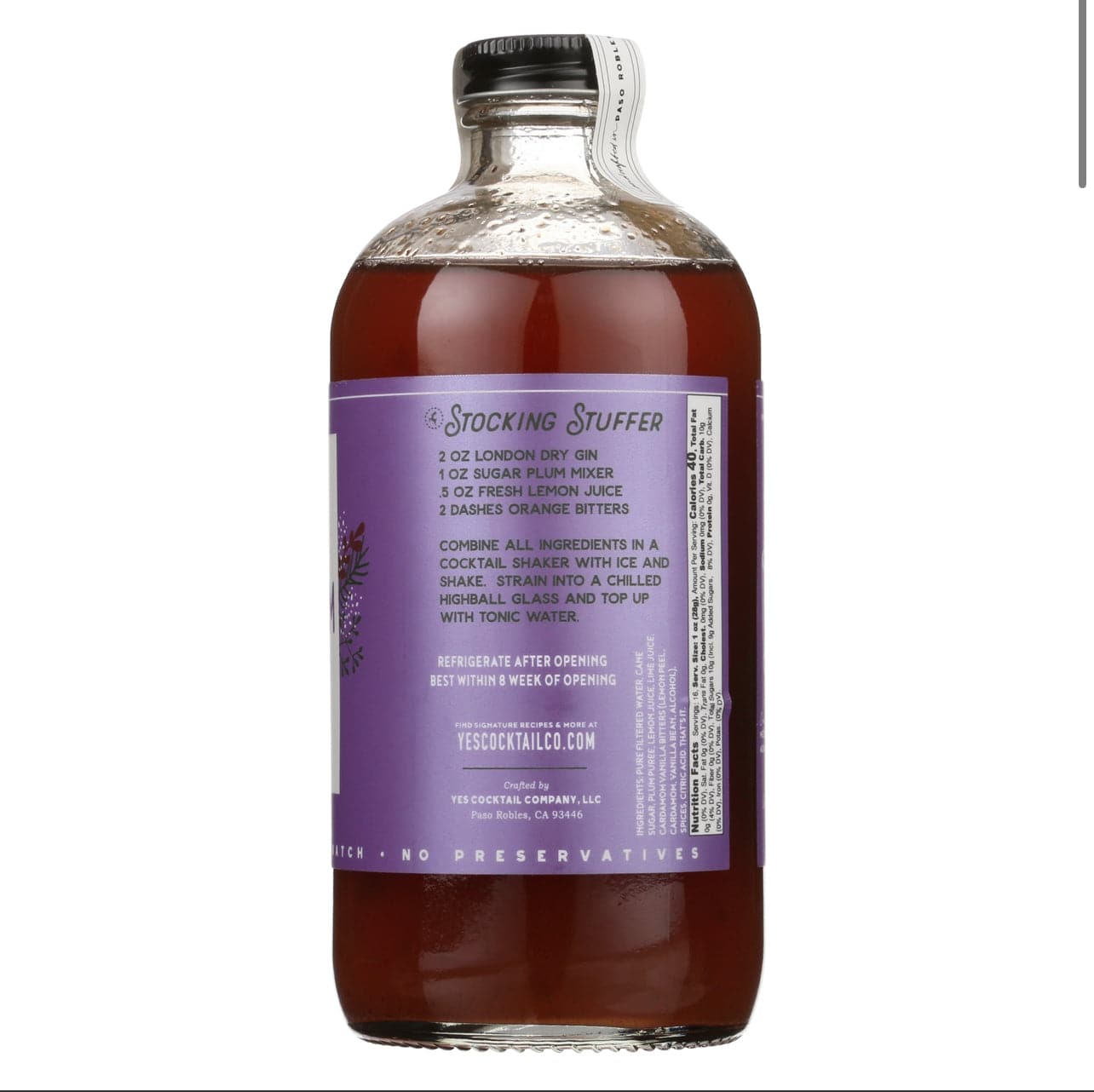 16 oz bottle of Suagr Plum Cocktail Mixer with the label sharing a recipe for a cocktail named Stocking Stuffer