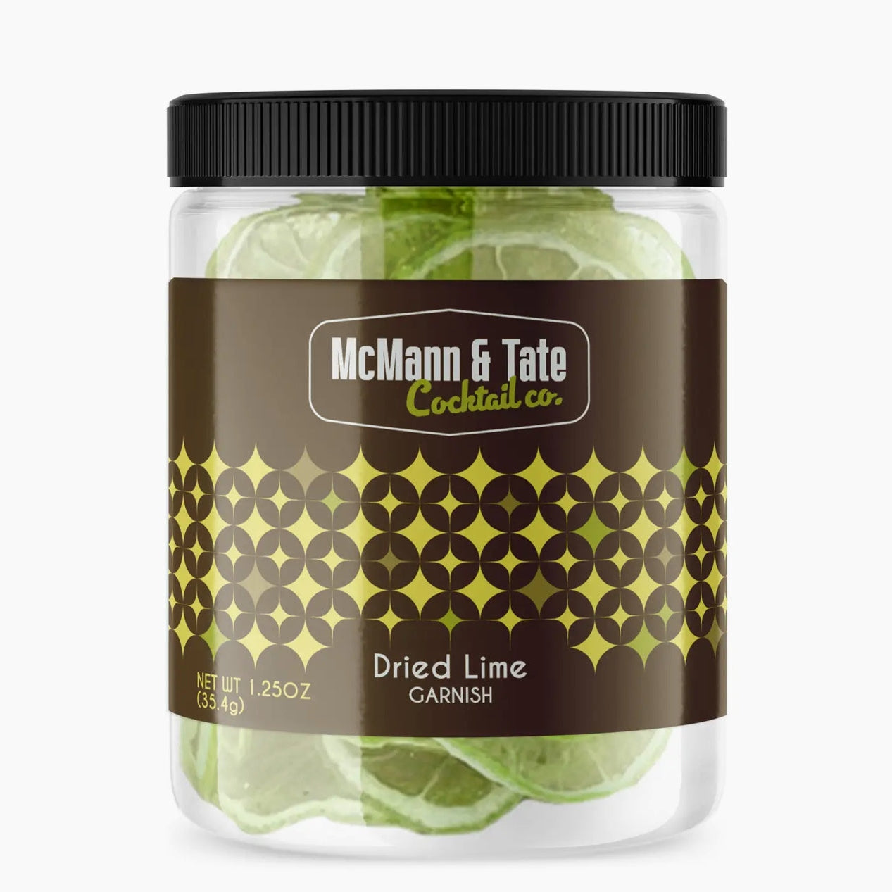 Dried lime cocktail garnishes by McMann & Tate in a jar on white background