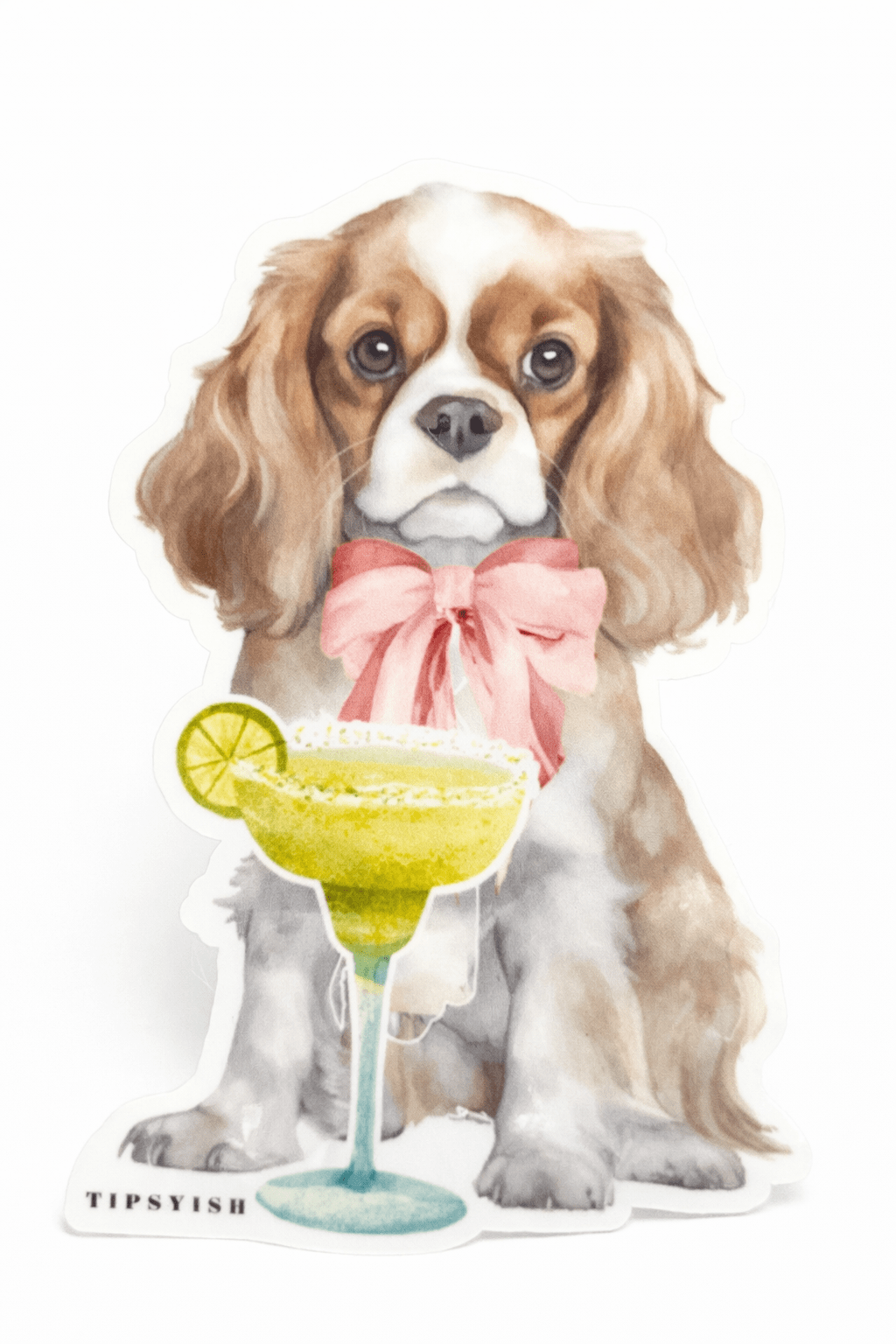 Dog with a pink bow sitting next to a cocktail with a lime wedge on a white background