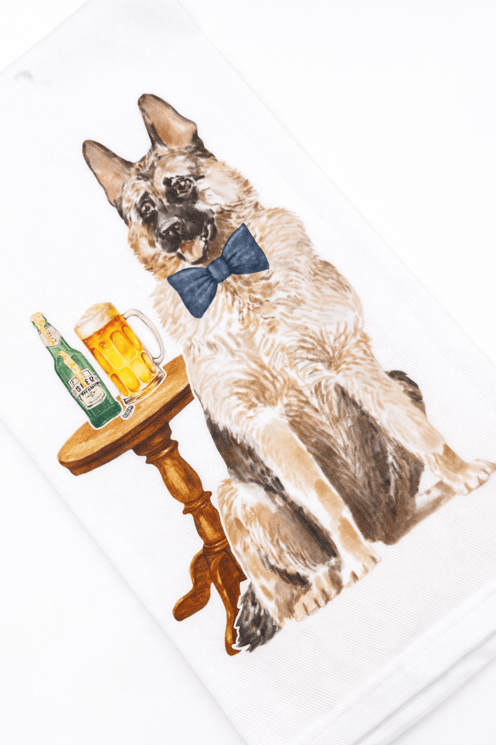 Dog wearing a bow tie sitting at a table with drinks on a white background
