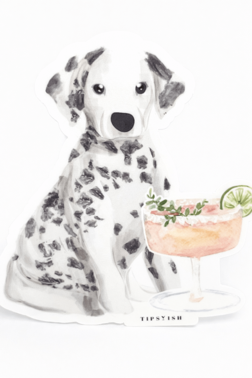 Dalmatian dog sticker holding a cocktail with 'Tipsyish' branding on a white background