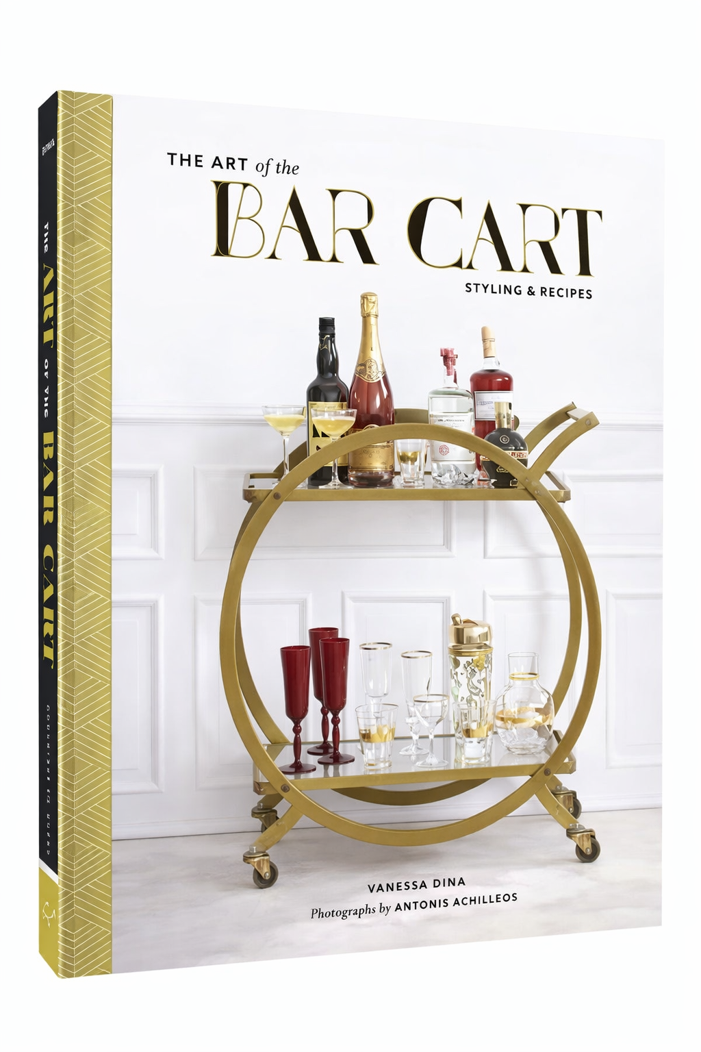 The Art of the Bar Cart book featuring a styled brass bar cart with cocktail glasses and bottles, a stylish gift for cocktail lovers and entertainers.