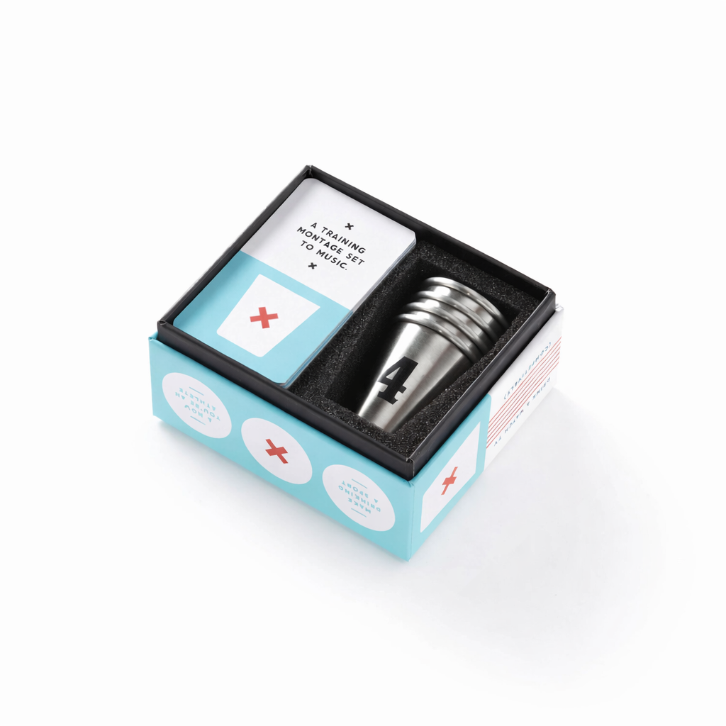 Open Booze Clues drinking game by Brass Monkey featuring game cards and numbered stainless steel shot glasses, a fun gift for cocktail lovers.