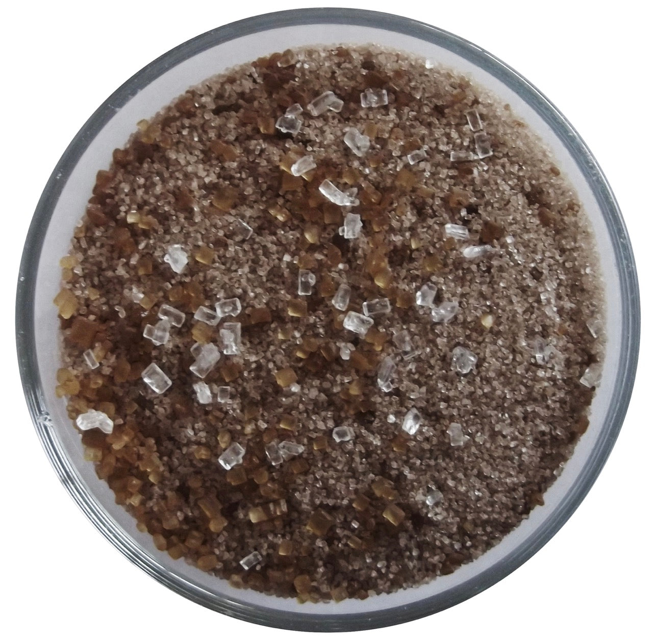 Close-up of chocolate cocktail rim sugar made with cocoa powder, demerara sugar, and sparkling sugar crystals.