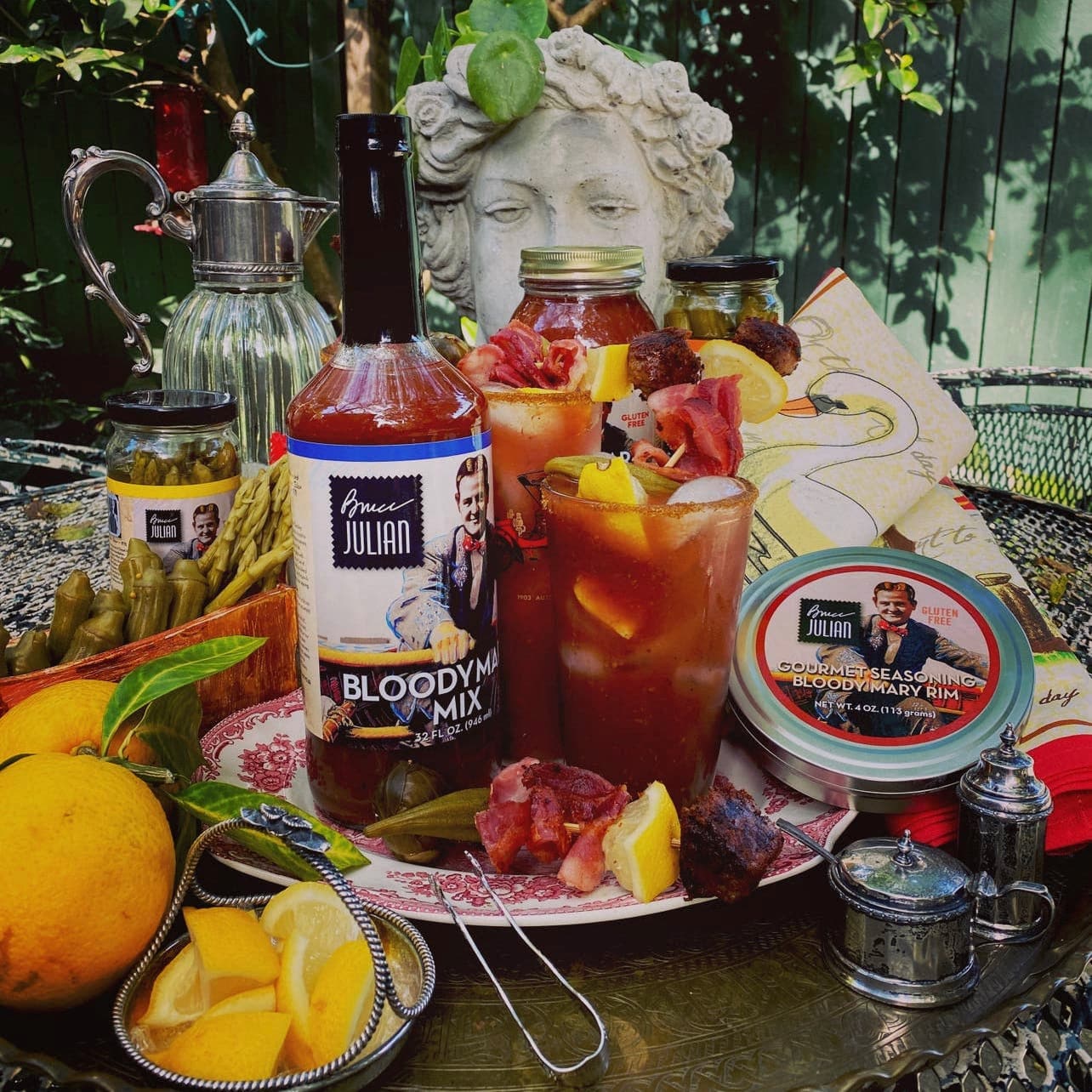 Bloody Mary mix shown with spice rimmer and cocktail garnish