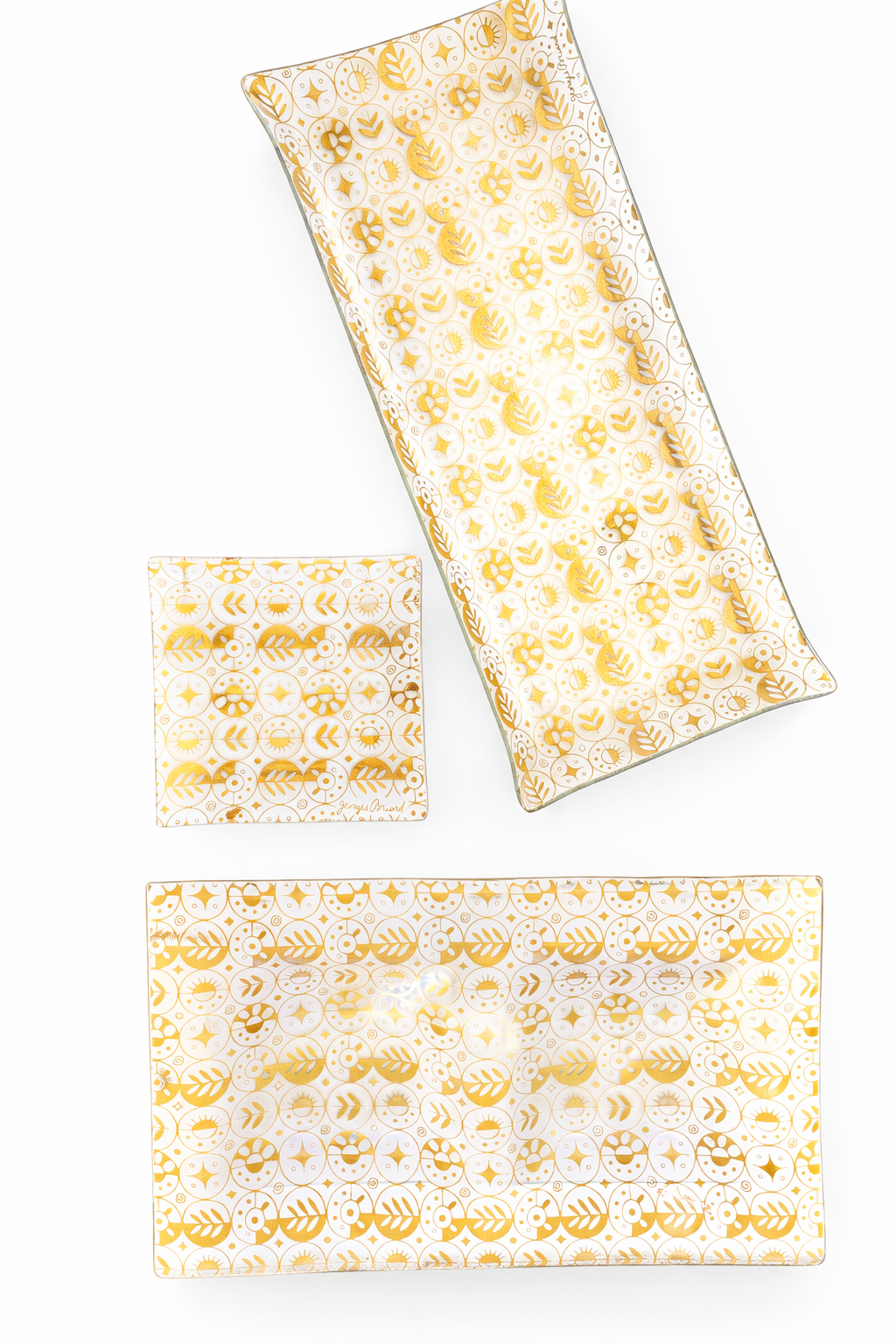 Vintage Georges Briard 22K gold atomic serving set including long tray, large platter, and square dish in mid-century modern pattern