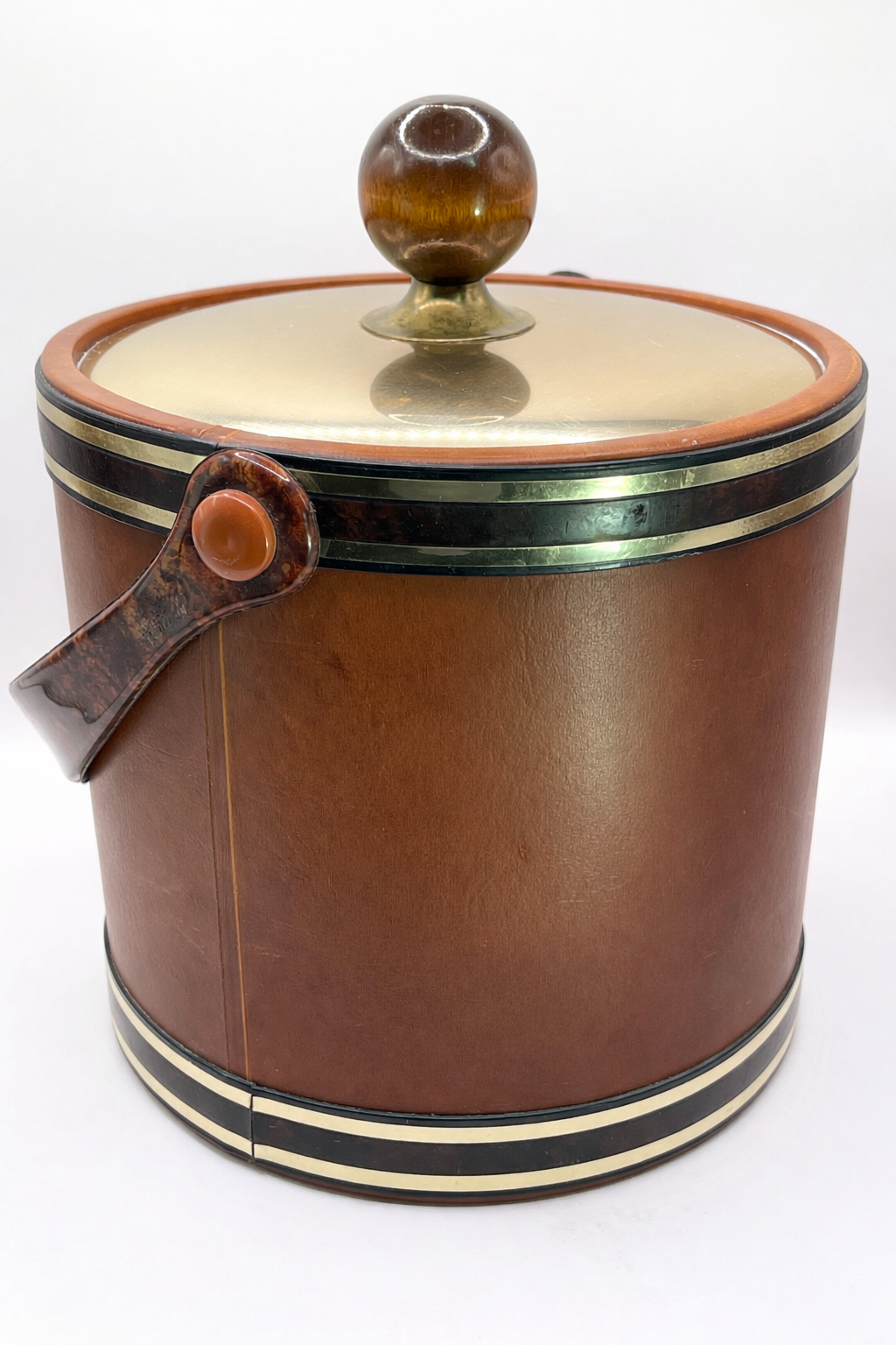 Vintage Kraftware mid century modern brown faux leather ice bucket with brass trim and tortoiseshell lucite scoop handle