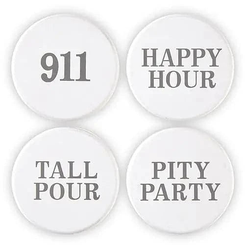 Four white round bottle stoppers with text on them, indicating different times of the day, e.g.