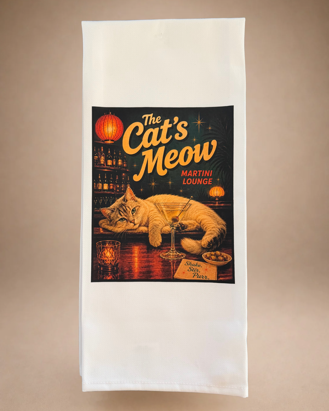 Retro cat tea towel featuring The Cat’s Meow Martini Lounge with a lounging cat, martini and vintage cocktail bar artwork.