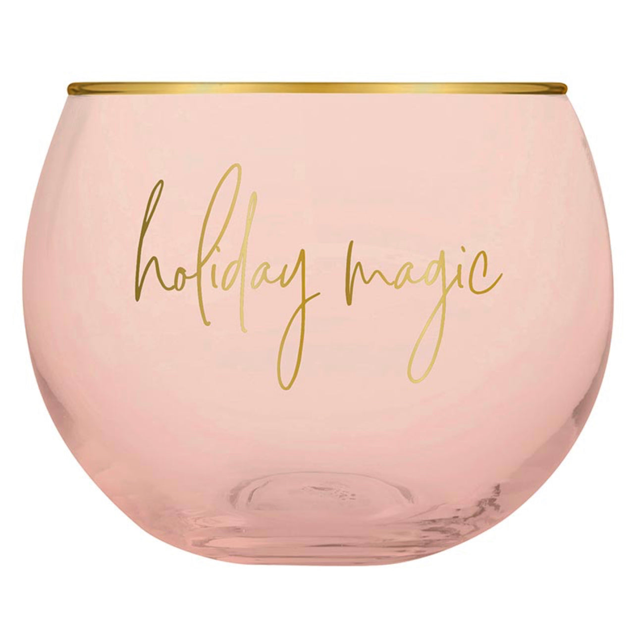 petite round cocktail glass in a blush color with a gold rim and gold script that reads "holiday magic"