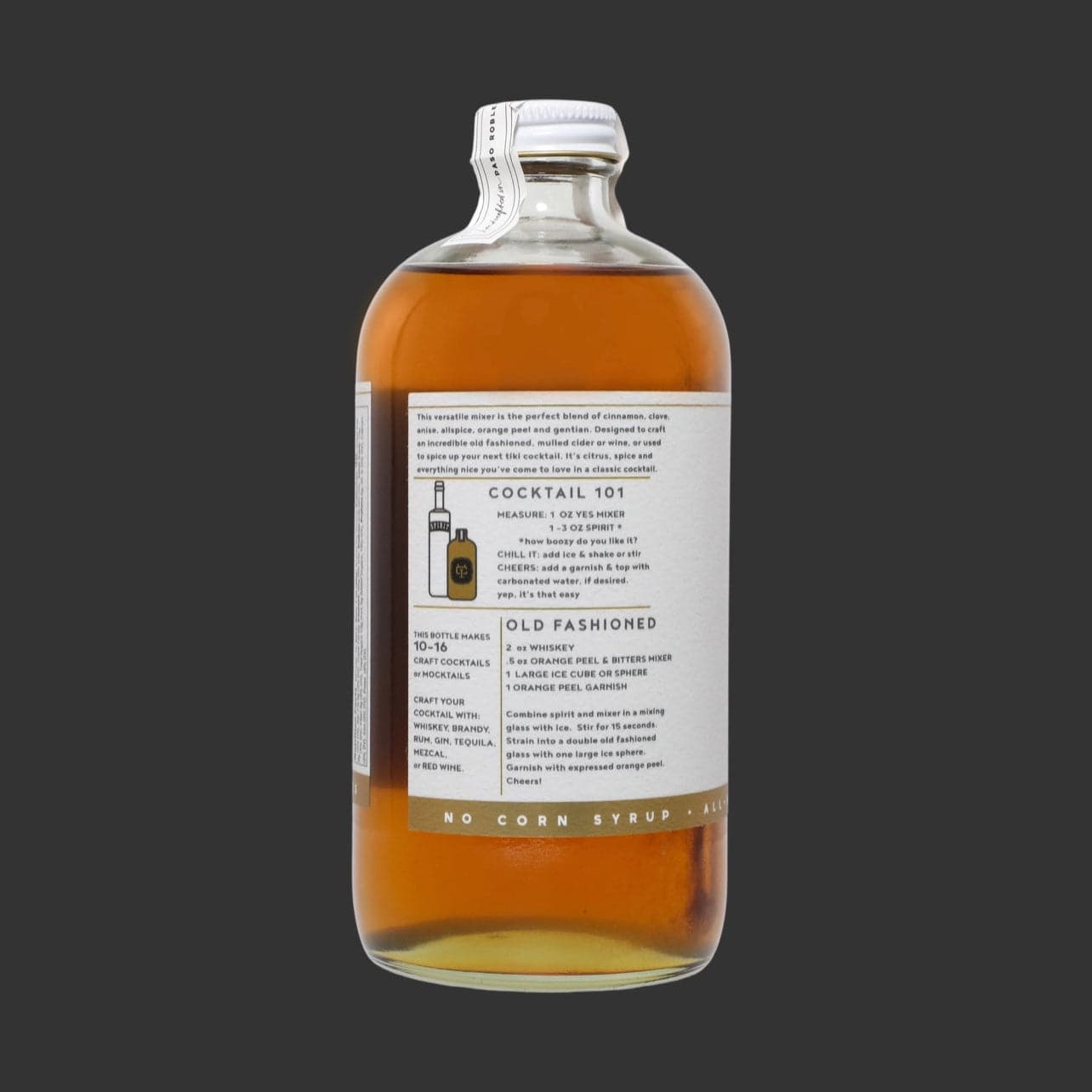 16 oz bottle of handcrafted Orange Peel and Bitters Cocktail Mixer by Yes Cocktail Co with label displaying information on making cocktails and a recipe for an old fashioned