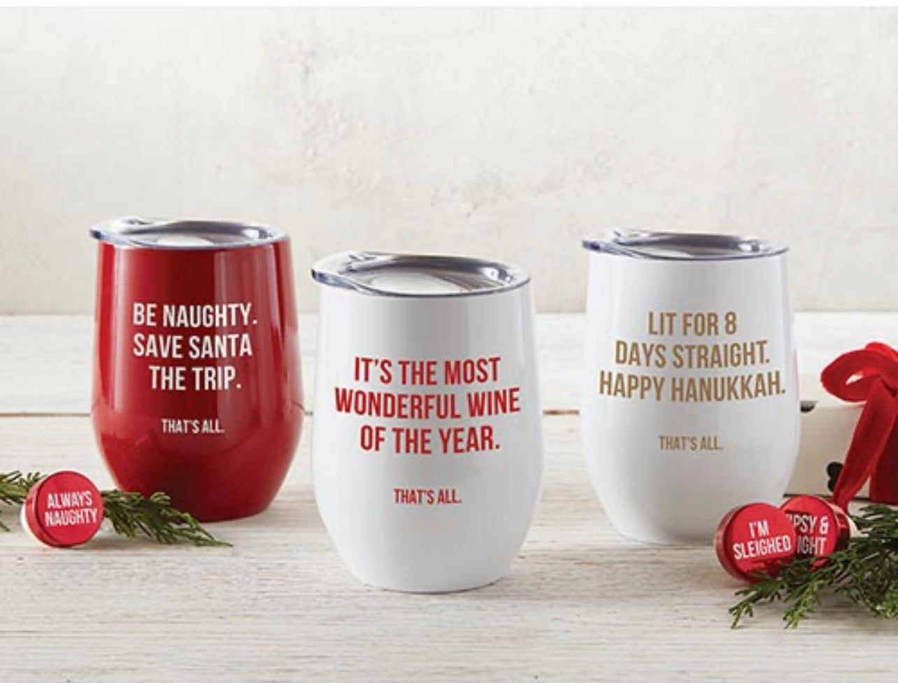 12 oz white christmas wine tumbler saying "It's the most wonderful wine of the year - that's all" displayed with other christmas wine tumblers
