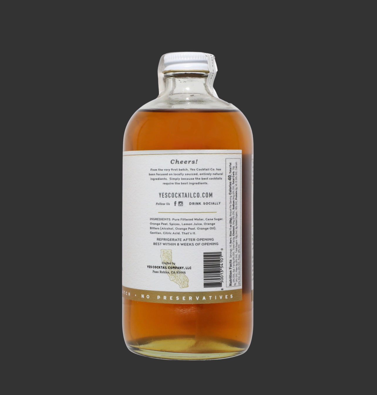 16 oz bottle of handcrafted Orange Peel and Bitters Cocktail Mixer by Yes Cocktail Co with label displaying nutritional information