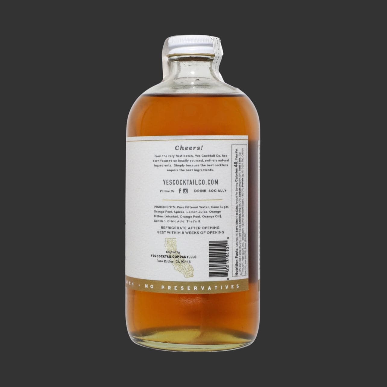 16 oz bottle of handcrafted Orange Peel and Bitters Cocktail Mixer by Yes Cocktail Co with label displaying nutritional information