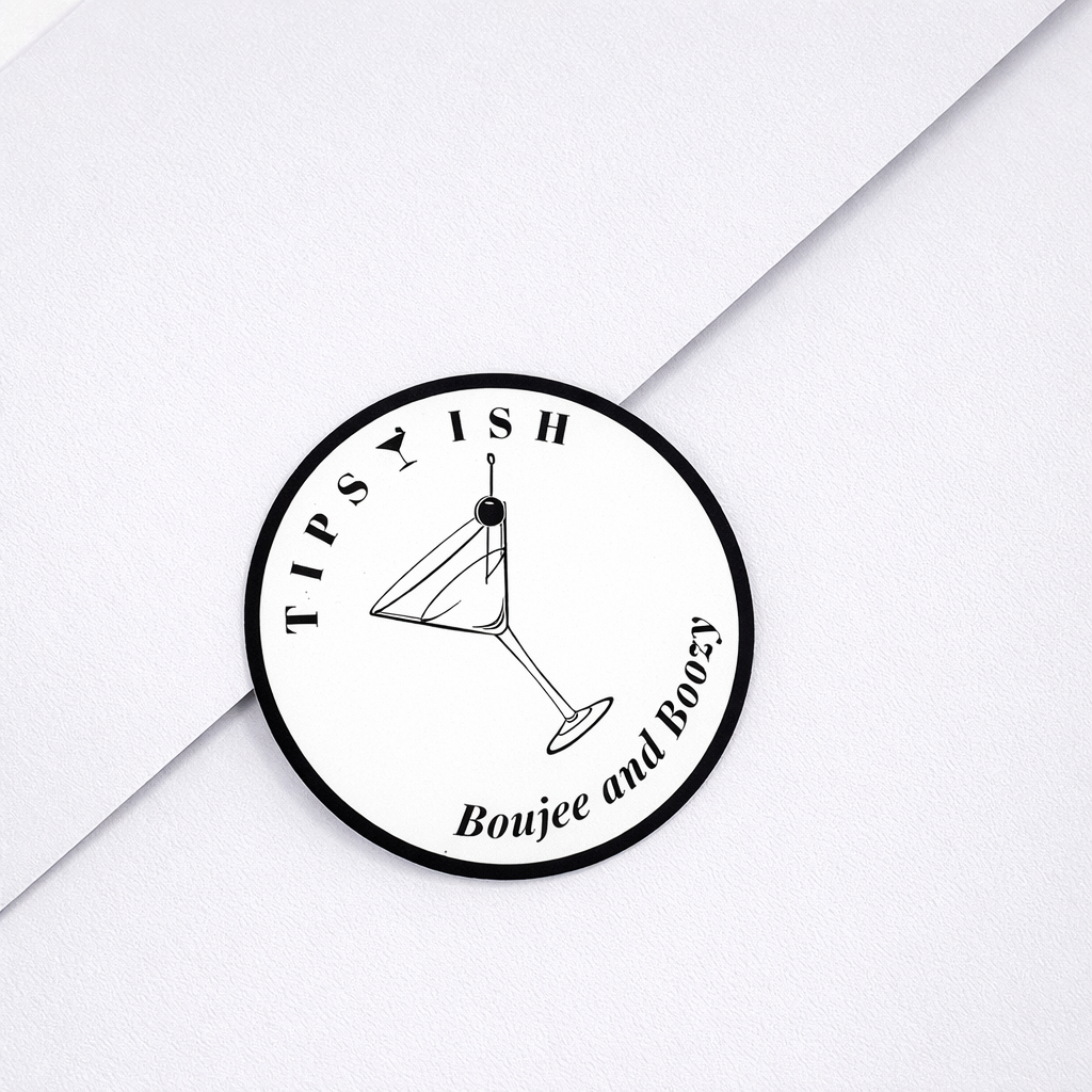 Circular logo with 'Tipsy Ish' text and a martini glass icon on a white background