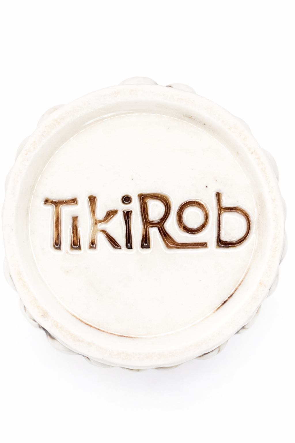 Bottom view of a RumHaven tiki mug showing Tiki Rob maker’s mark on glazed ceramic base”