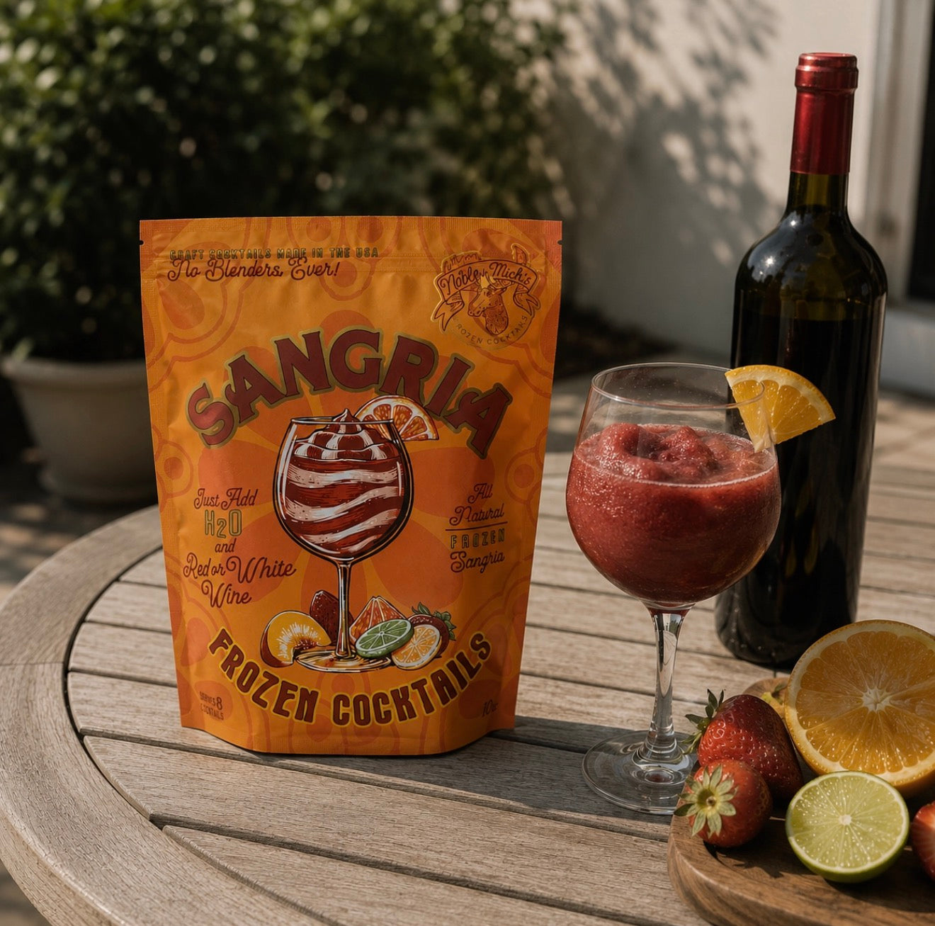 Noble Mick’s Frozen Sangria Cocktail Mix with a prepared frozen red wine sangria cocktail and fresh citrus and strawberries.