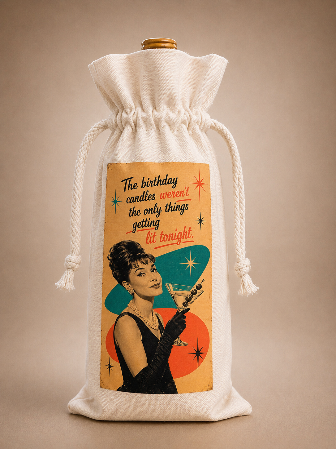 Retro birthday canvas wine gift bag with drawstring closure displayed around a standard wine bottle.