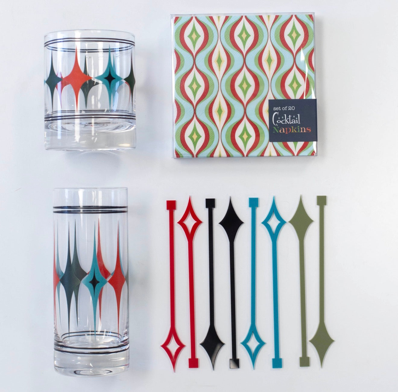 Retro acrylic cocktail stirrers displayed in elegant gift-ready packaging.