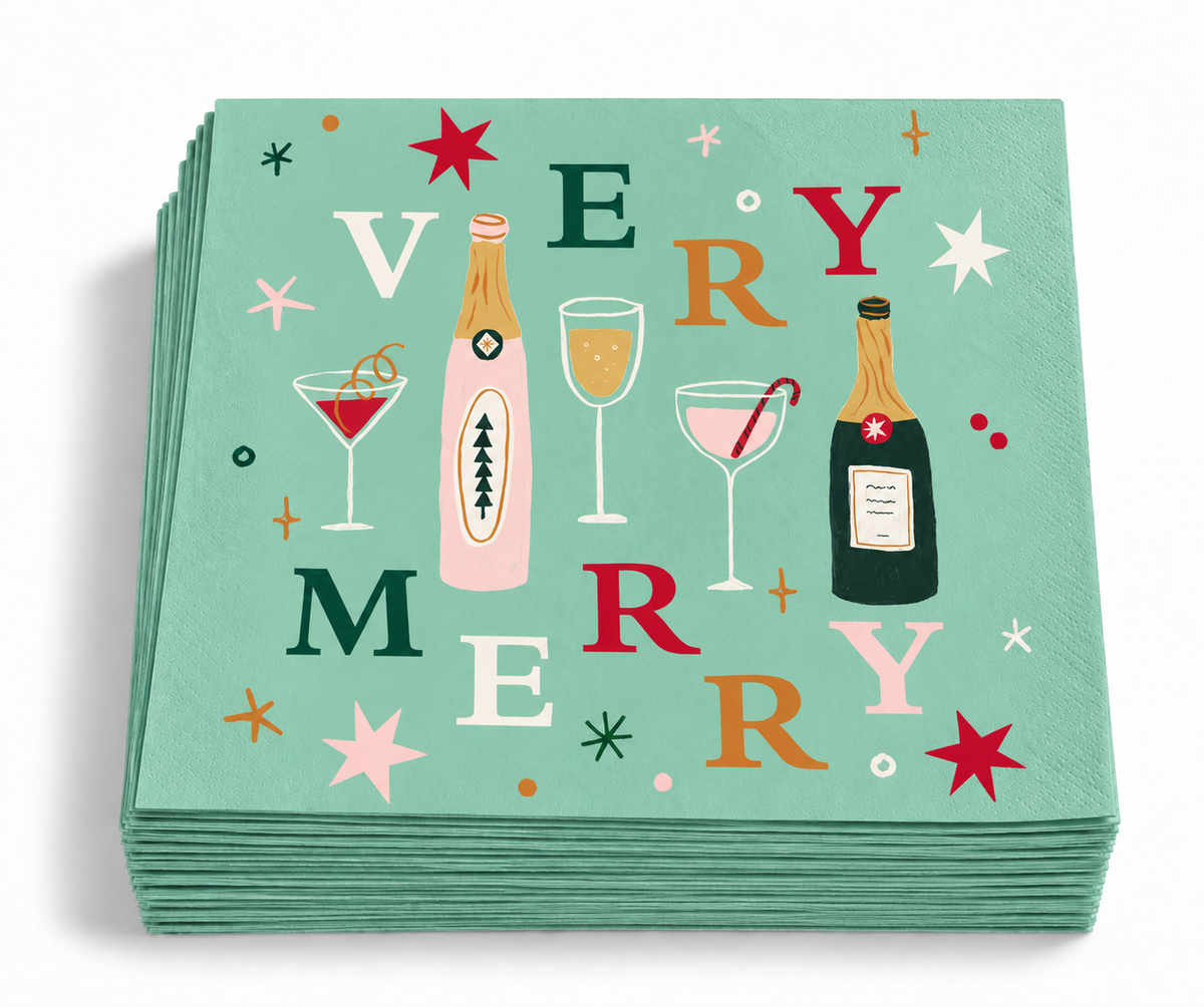 Stack of Very Merry mint green Christmas cocktail napkins featuring colorful bottles, cocktail glasses and retro holiday graphics.