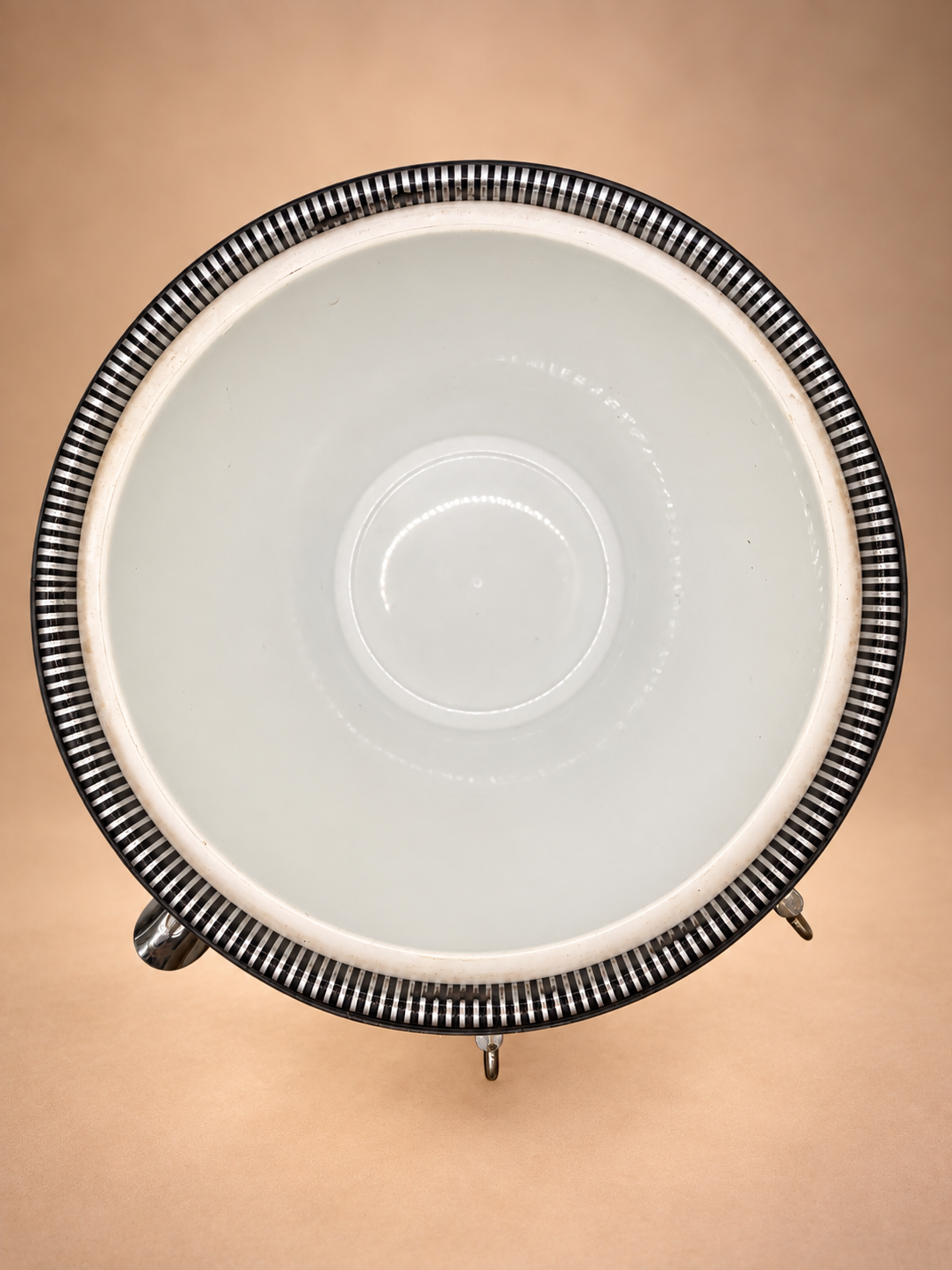 Overhead view of vintage black and silver striped ice bucket showing clean white interior liner.