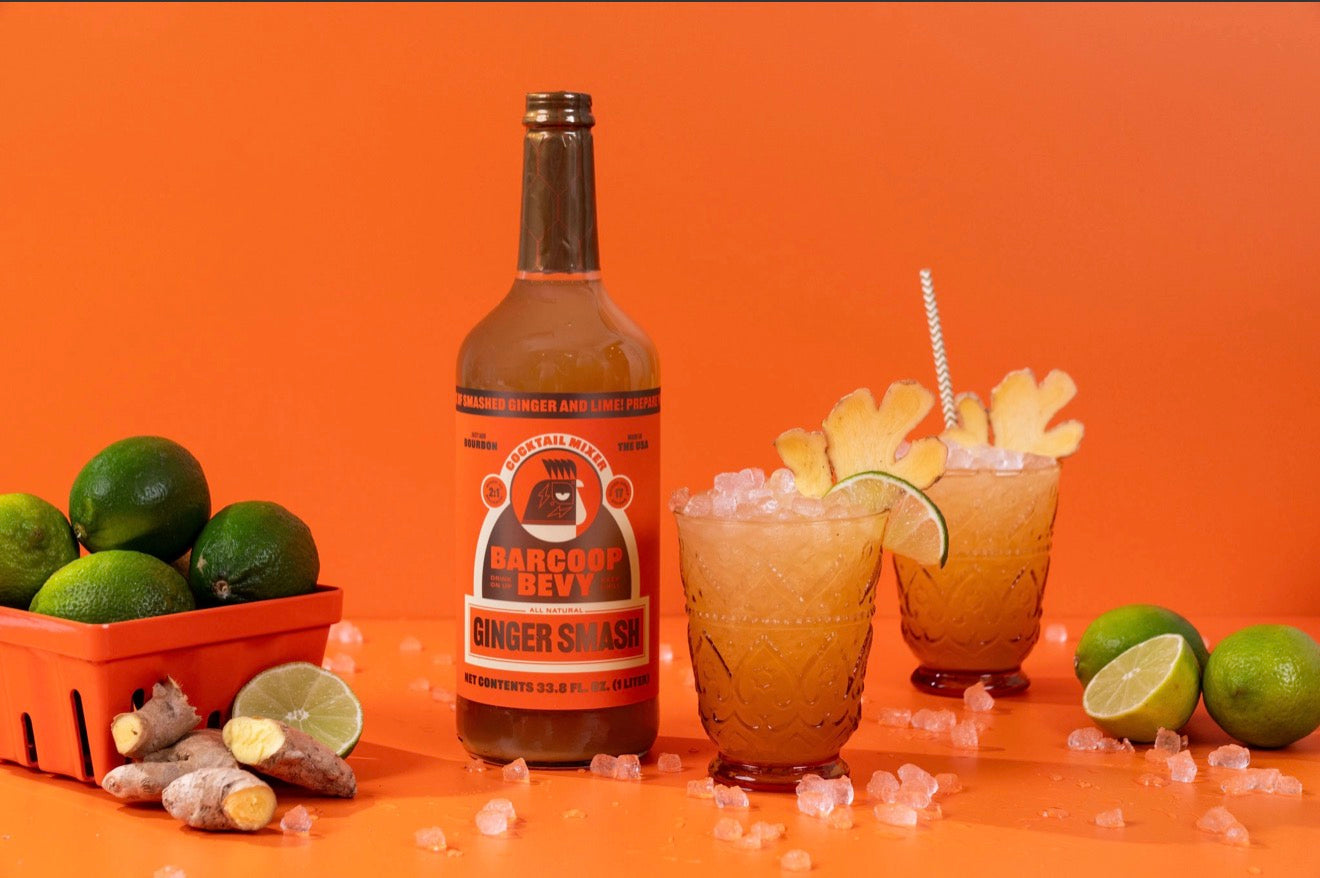 Cocktails made with Barcoop Bevy ginger smash mixer served with lime and crushed ice
