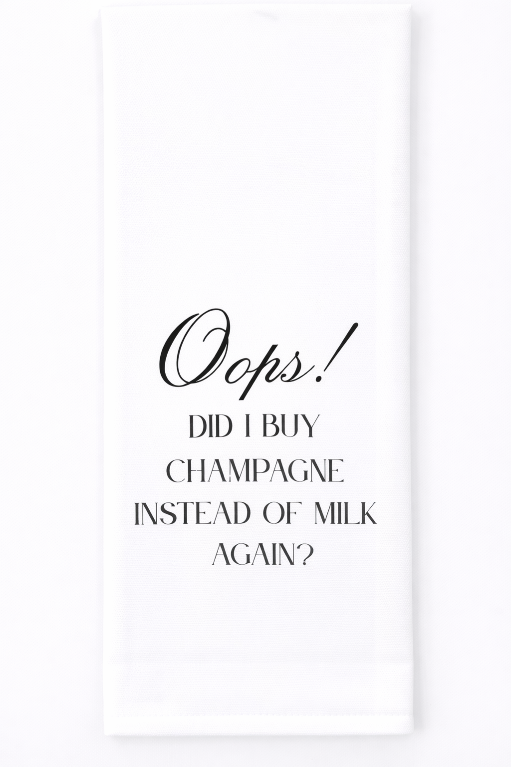White kitchen tea towel with funny champagne quote in black text