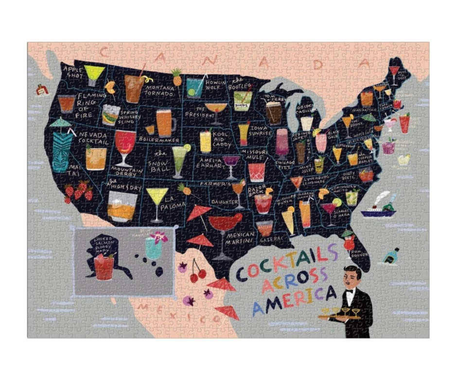 Completed Cocktails Across America 1000-piece puzzle showing an illustrated map of the United States with signature cocktails from all 50 states.