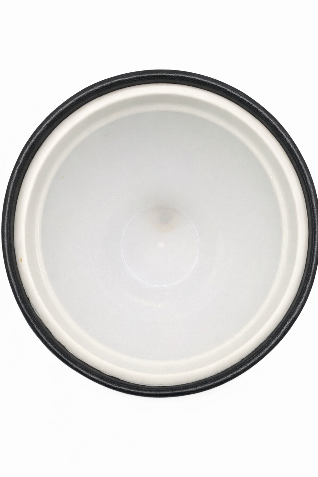 Interior insulated liner of vintage Courroc ice bucket in white plastic.
