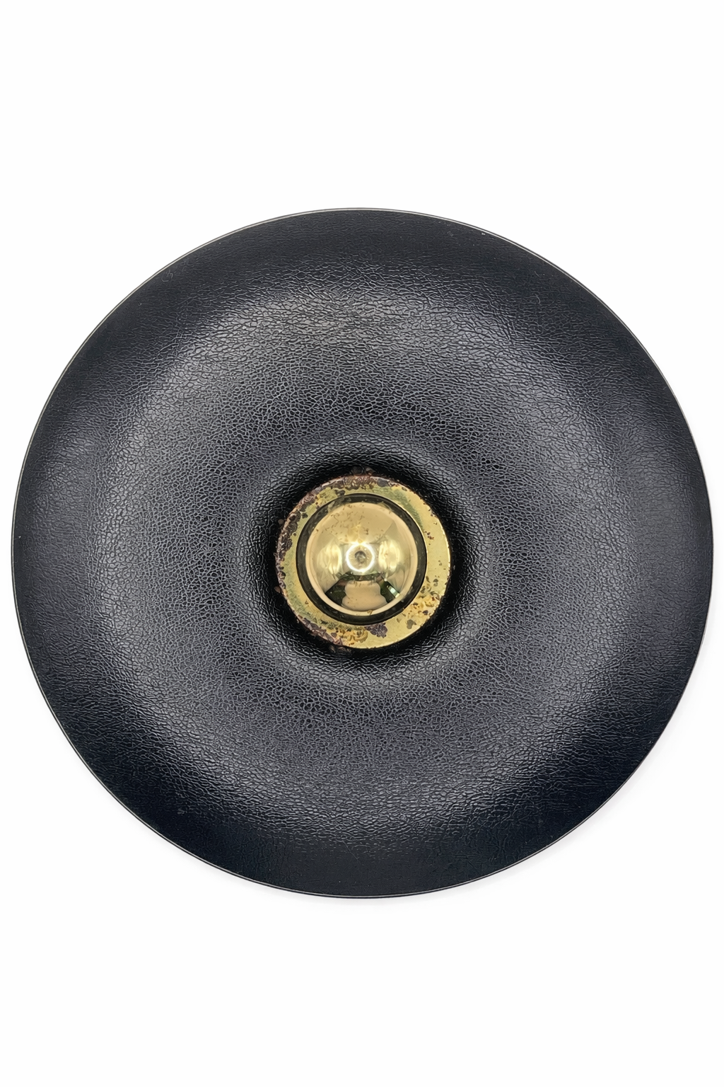Top view of vintage Courroc ice bucket lid with brass knob and textured black finish.
