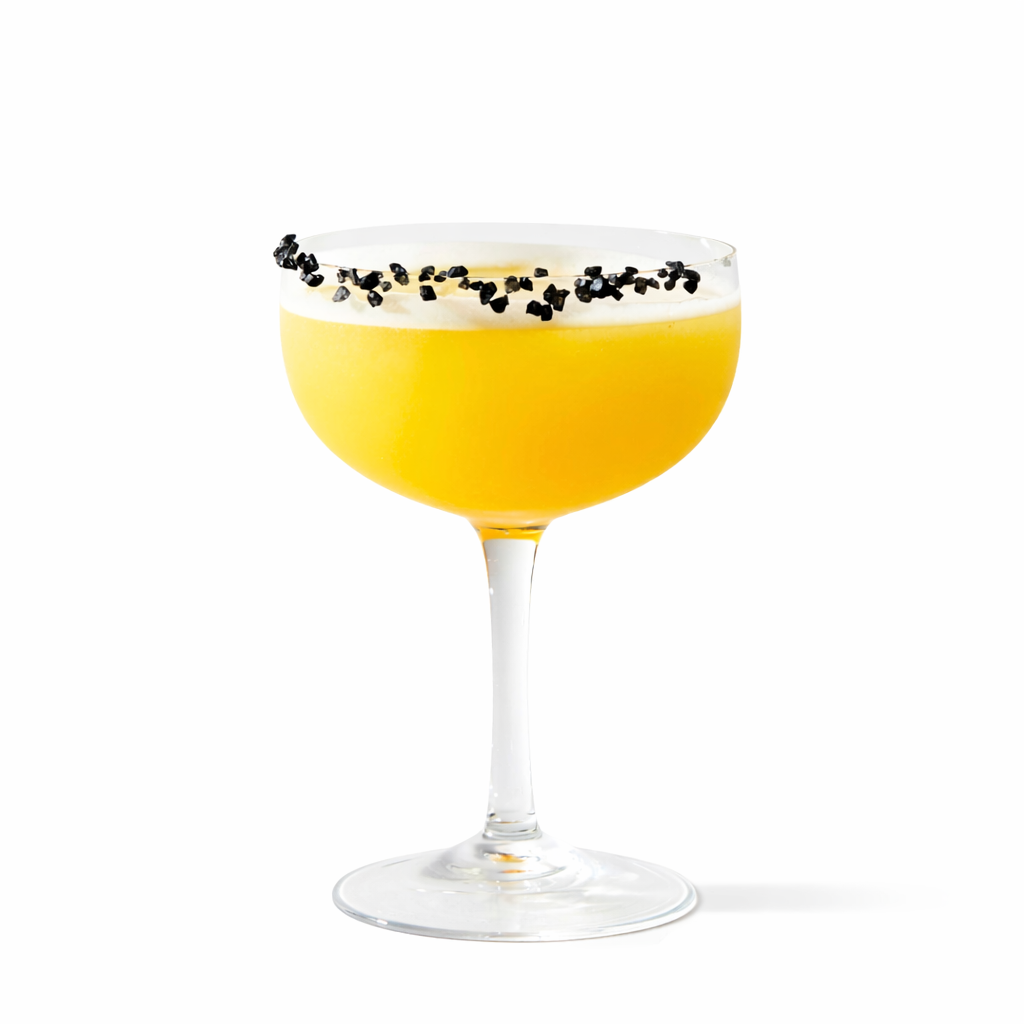 margarita cocktail in coupe glass made with grapefruit honey mixer and black salt rim garnish
