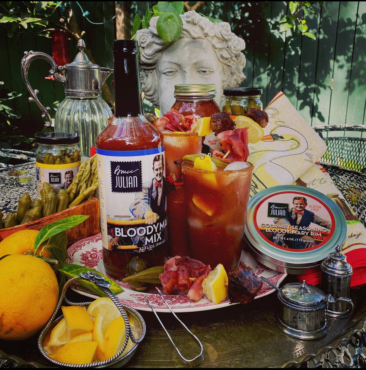 Bloody Mary mix shown with spice rimmer and cocktail garnish 