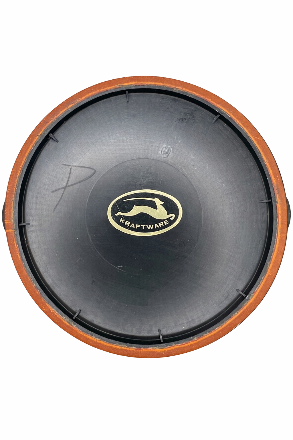 Underside of vintage Kraftware ice bucket showing original Kraftware logo mark