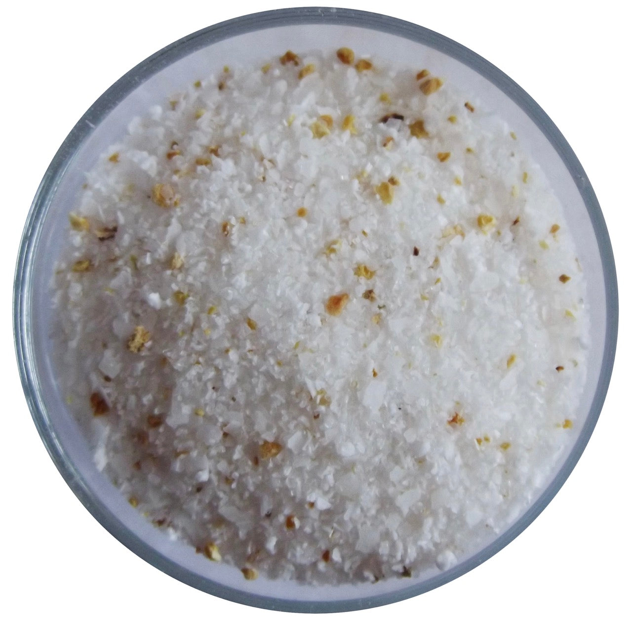 Close-up of lime margarita cocktail salt with flake salt and dried citrus peel.