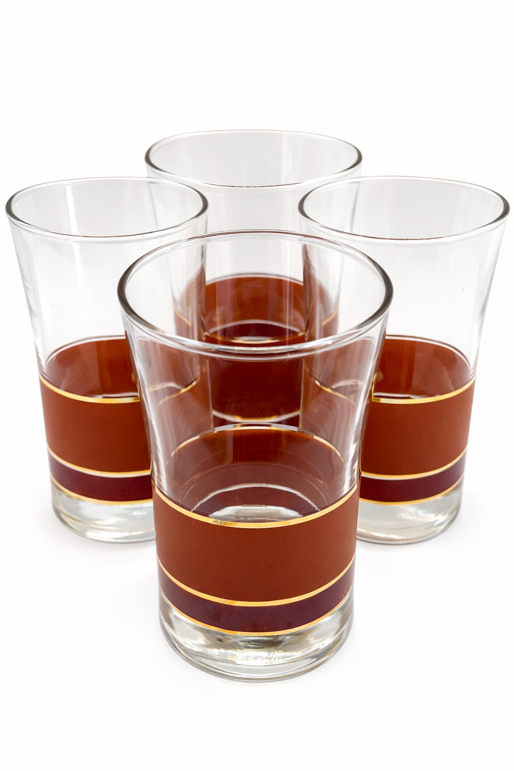 Vintage highball glass set of four with brown and burgundy color bands and gold detailing, mid-century modern barware