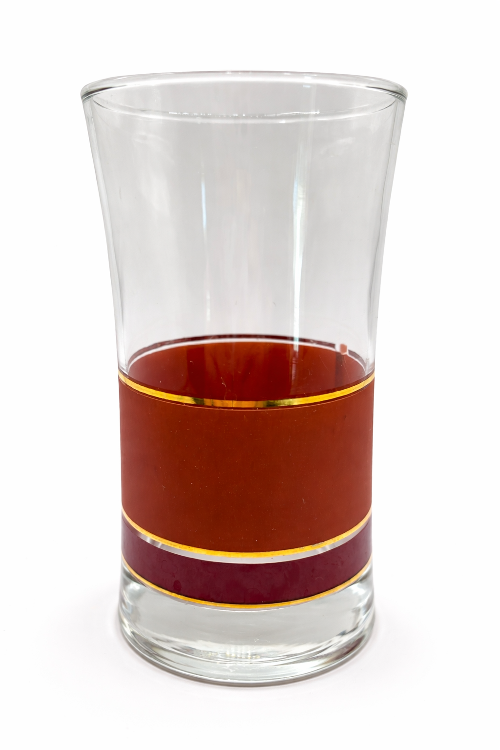 Single vintage mid-century modern highball glass with brown band, burgundy stripe, and gold trim detail
