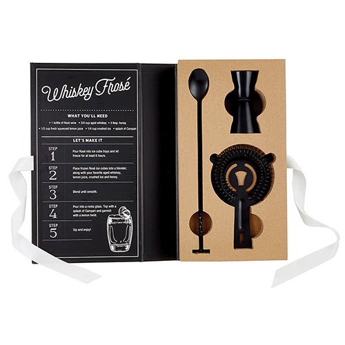 black book box open to display the included matte black barware: bar spoon, jigger, and strainer. The inside cover of the box features a recipe for a whiskey frose
