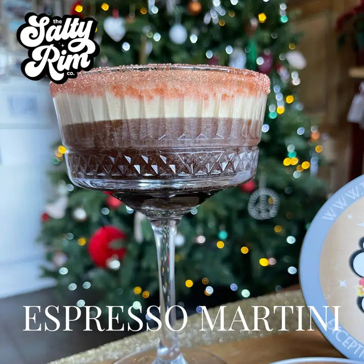 espresso martini in a cut glass rimmed with the bronze sugar dust