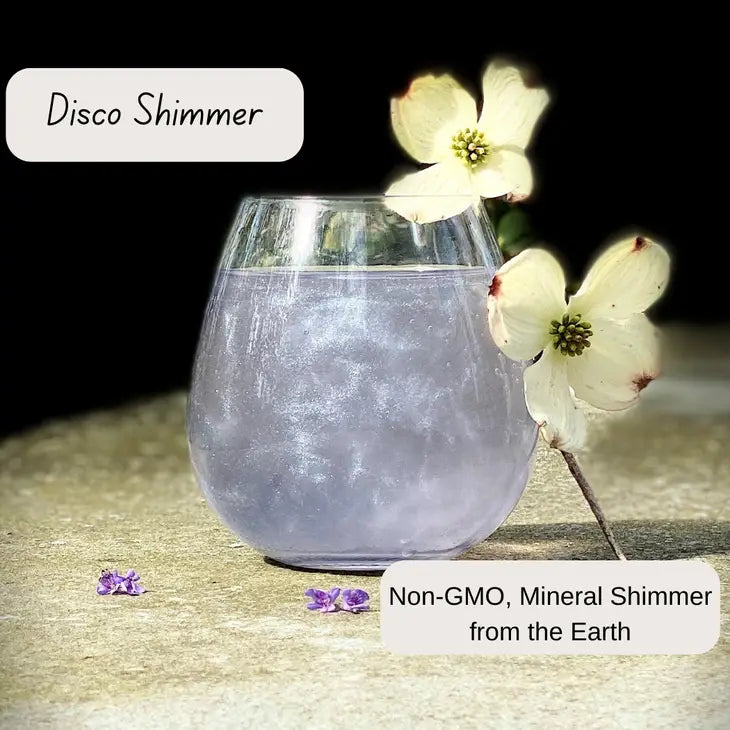 lavender mixed in drink creates a purple glitter effect 