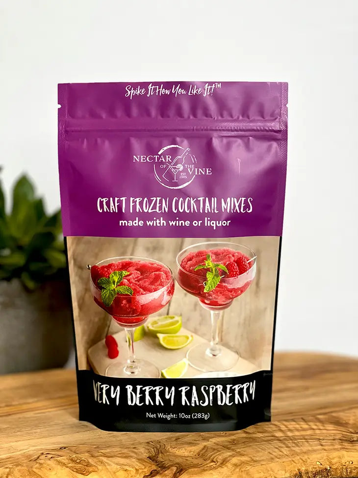 package of Very Berry Raspberry craft frozen cocktail mix displayed on a wooden surface